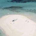 Fly by Helicopter to a Secluded Sandy Cay on the Great Barrier Reef (*61)